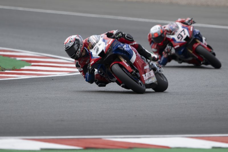 Grit and determination carry the two Team HRC rookies to the line at a physical Donington